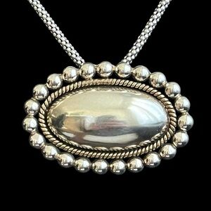 Vintage Laton Taxco Mexico Sterling silver and brass pendant